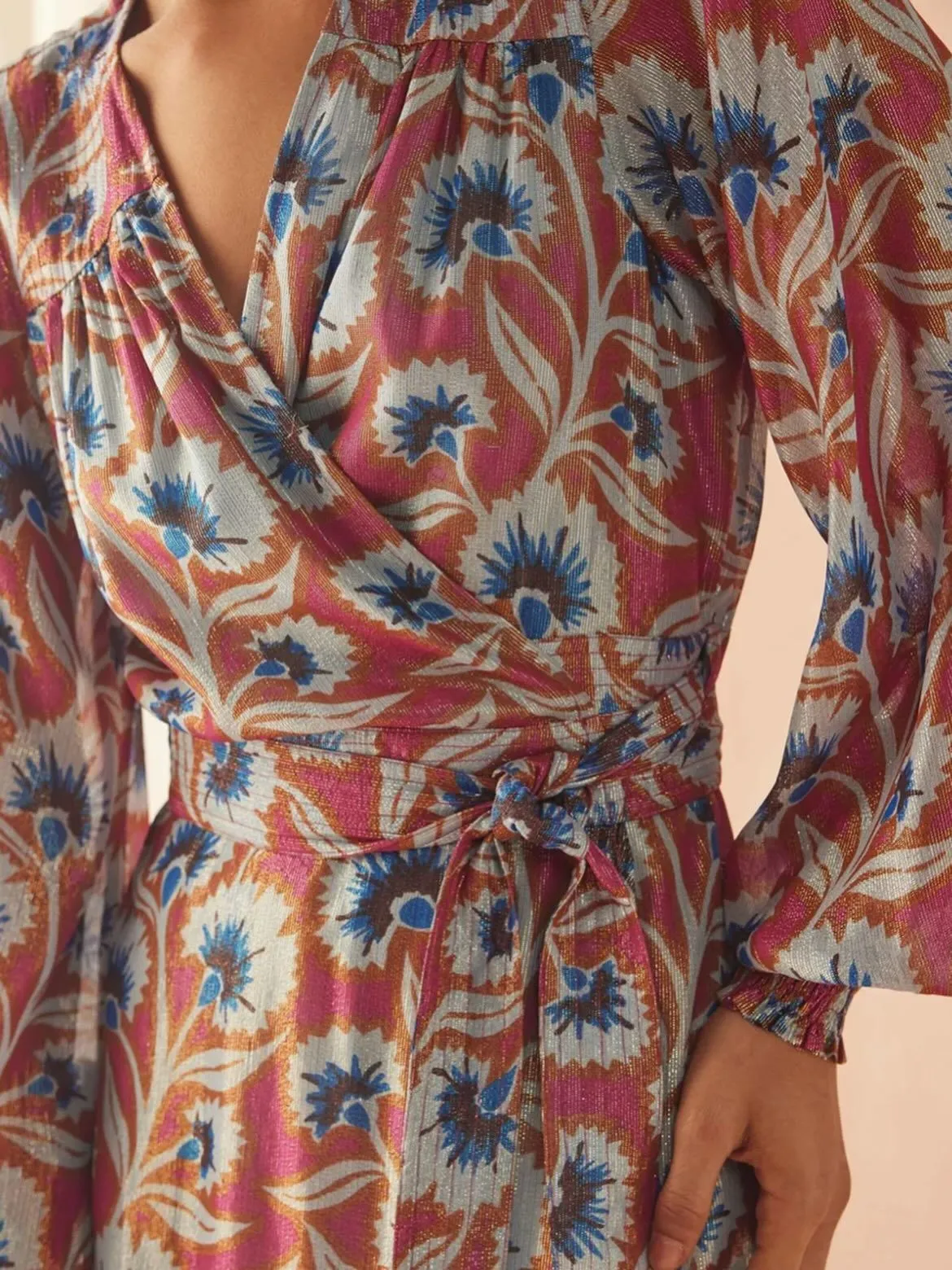 Texture shot of fluid matte jersey fabric with micro floral print