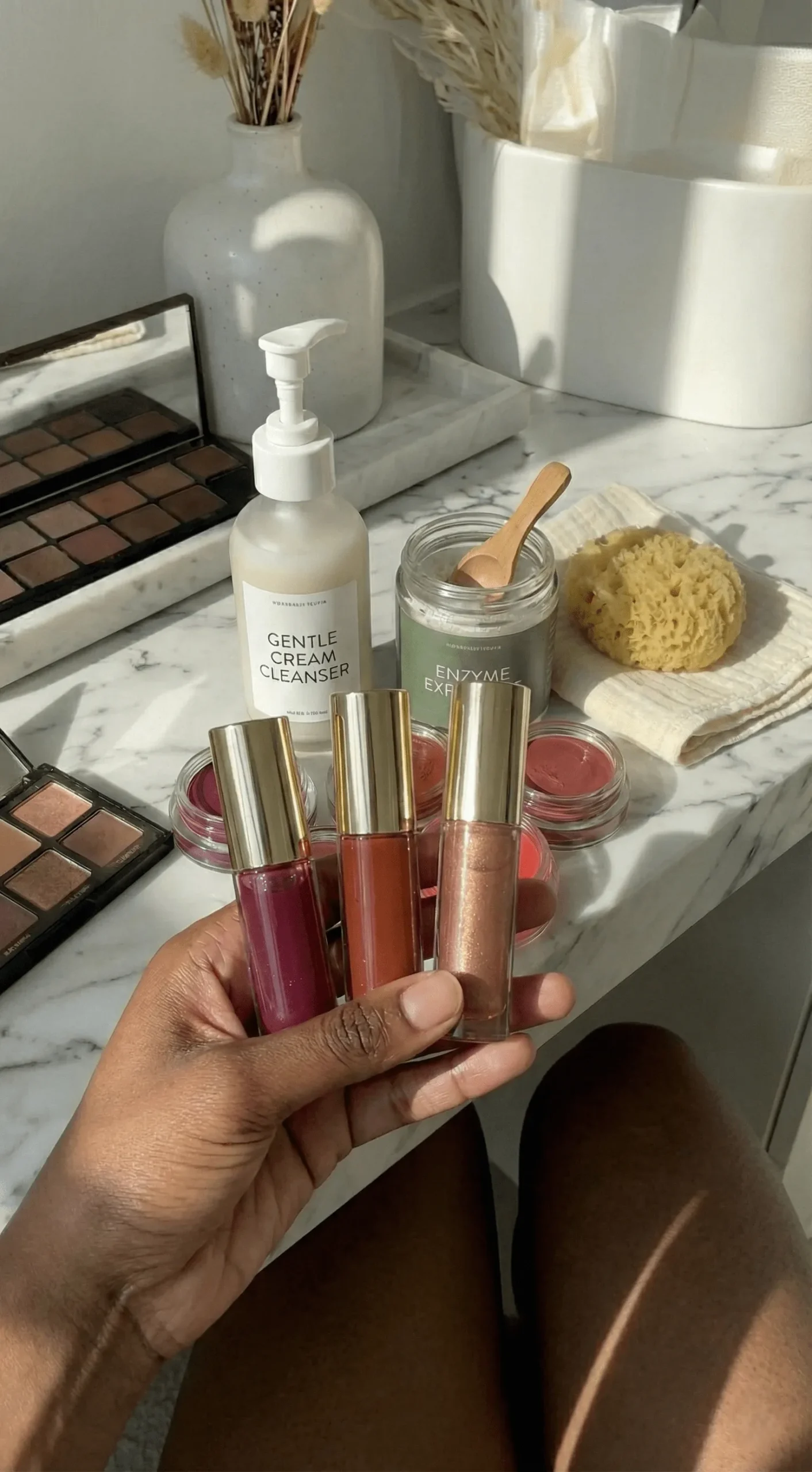 Trio of deep red and berry lip oils suitable for dark skin tones