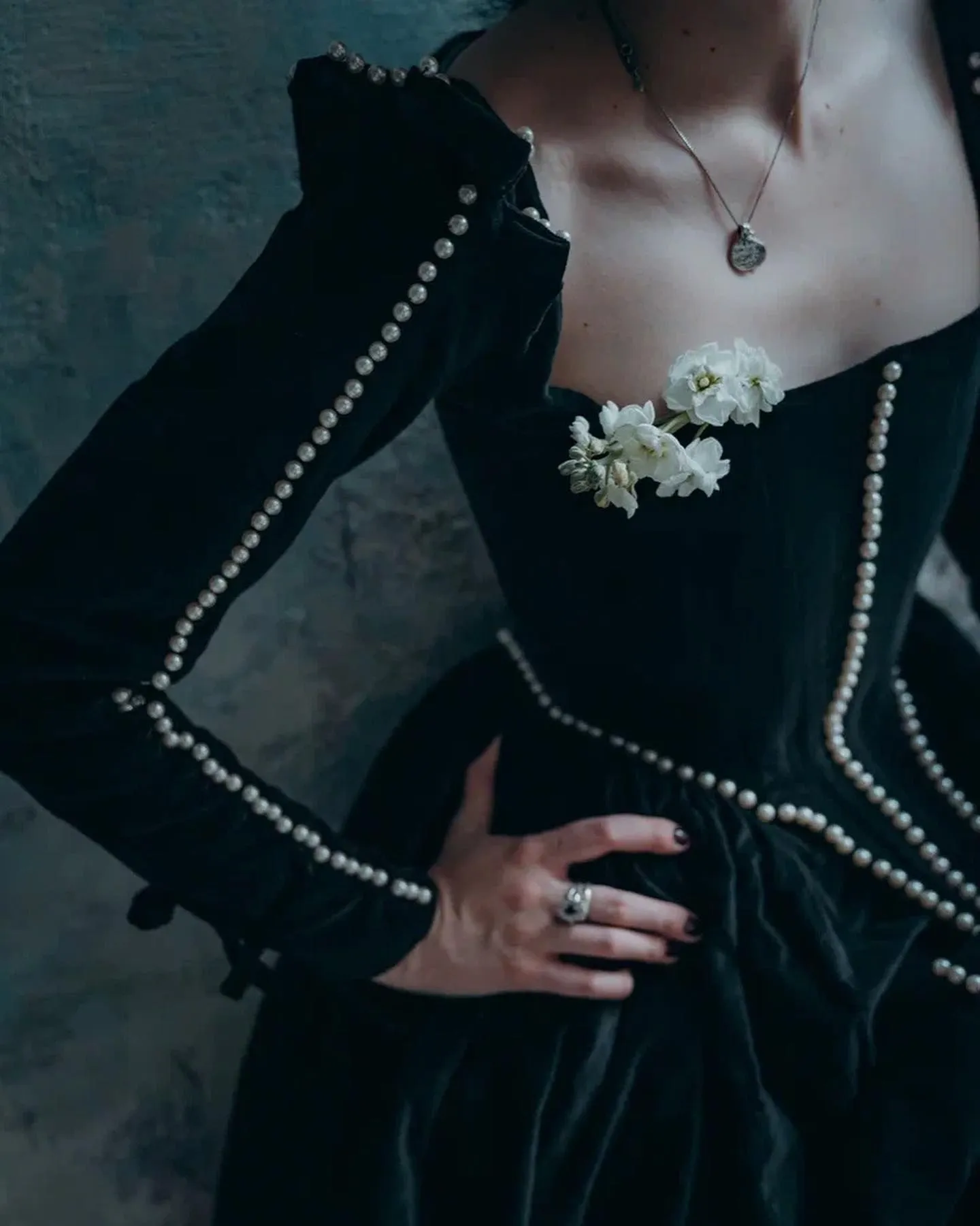 Close up of black velvet fabric texture on a woman