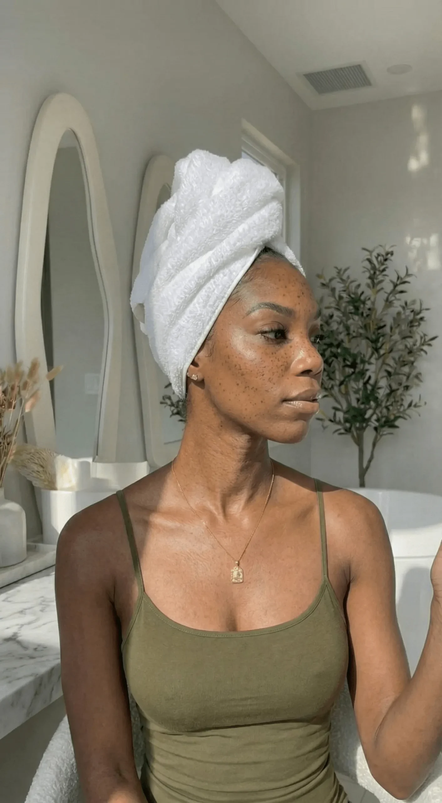 Side profile showing freckle placement on high cheekbones