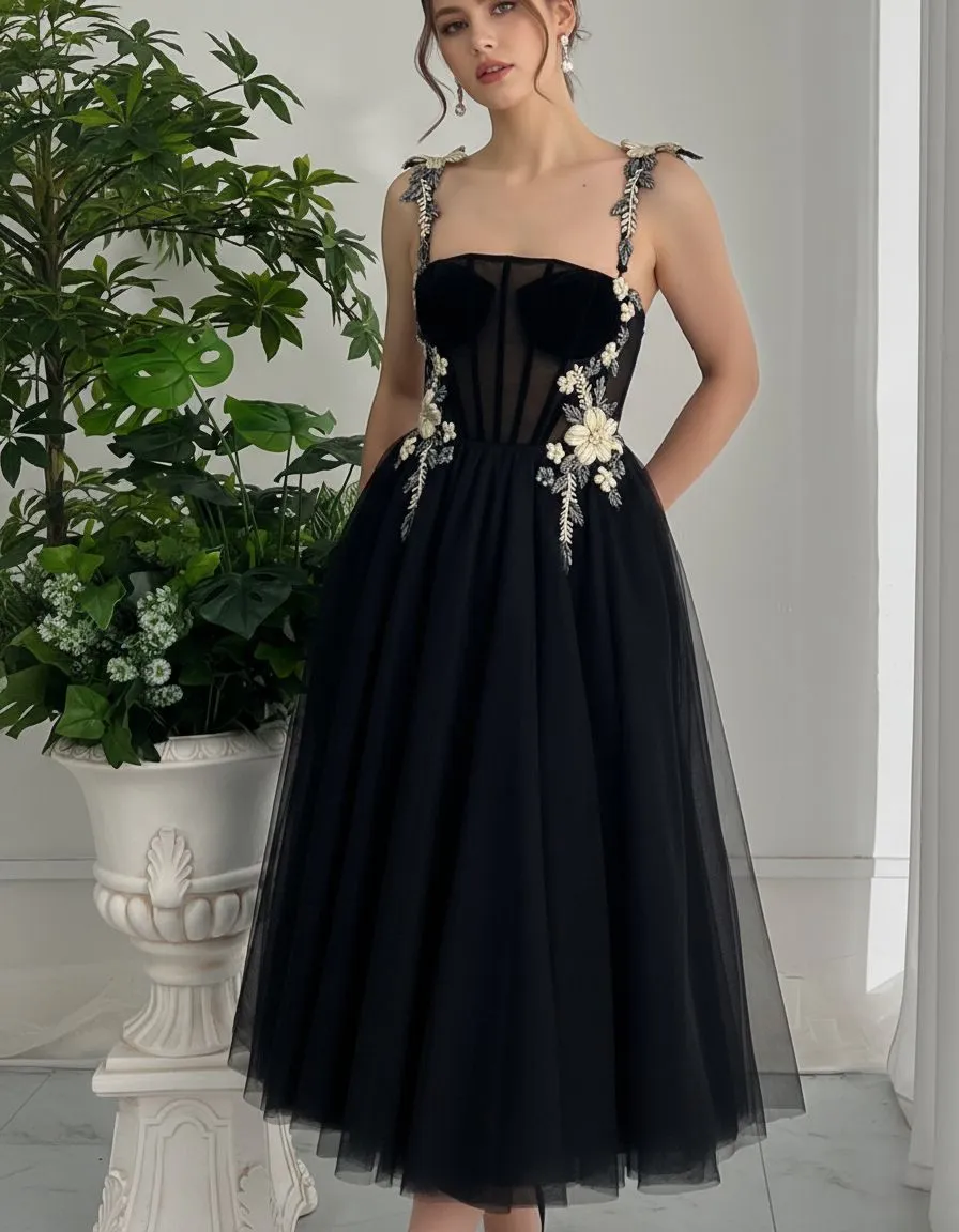 Woman wearing a black corset tulle midi dress for a dark romance Valentine