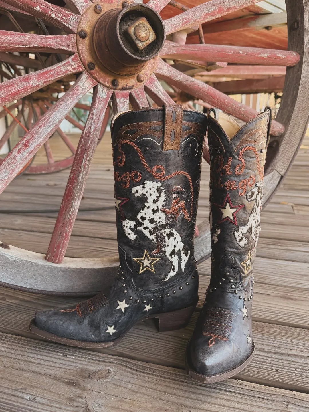 Beige suede cowboy boots with floral dress