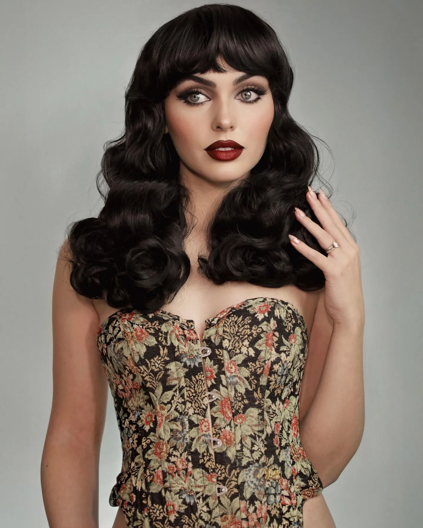 Model with deep berry lipstick and glowing skin for Valentine