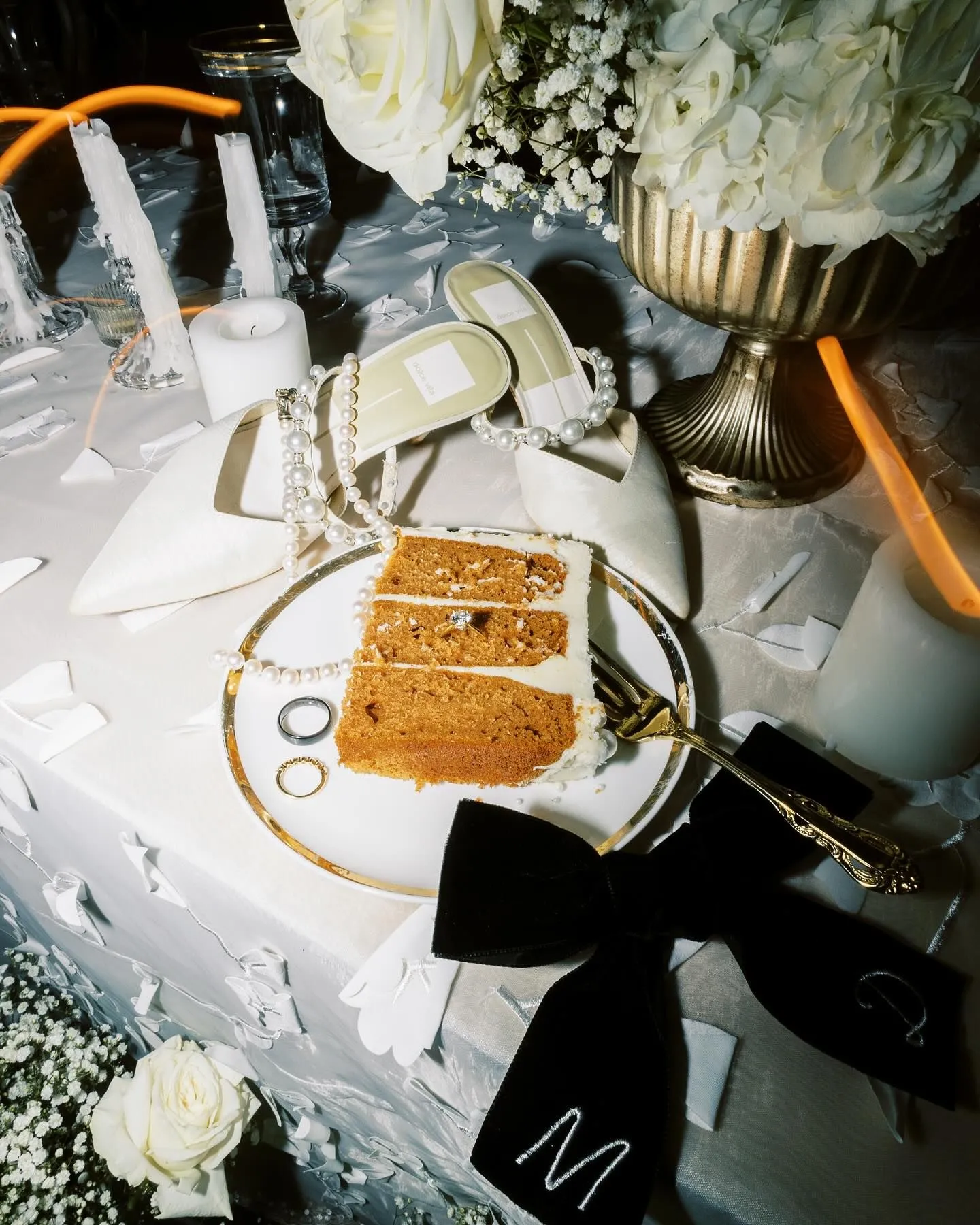 Flat lay of day versus night accessories for linen dress