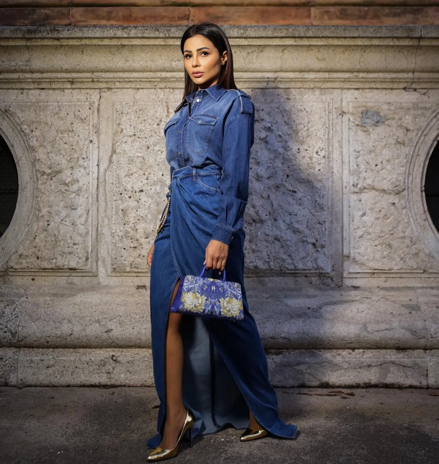 Evening makeup and accessories paired with a denim western dress
