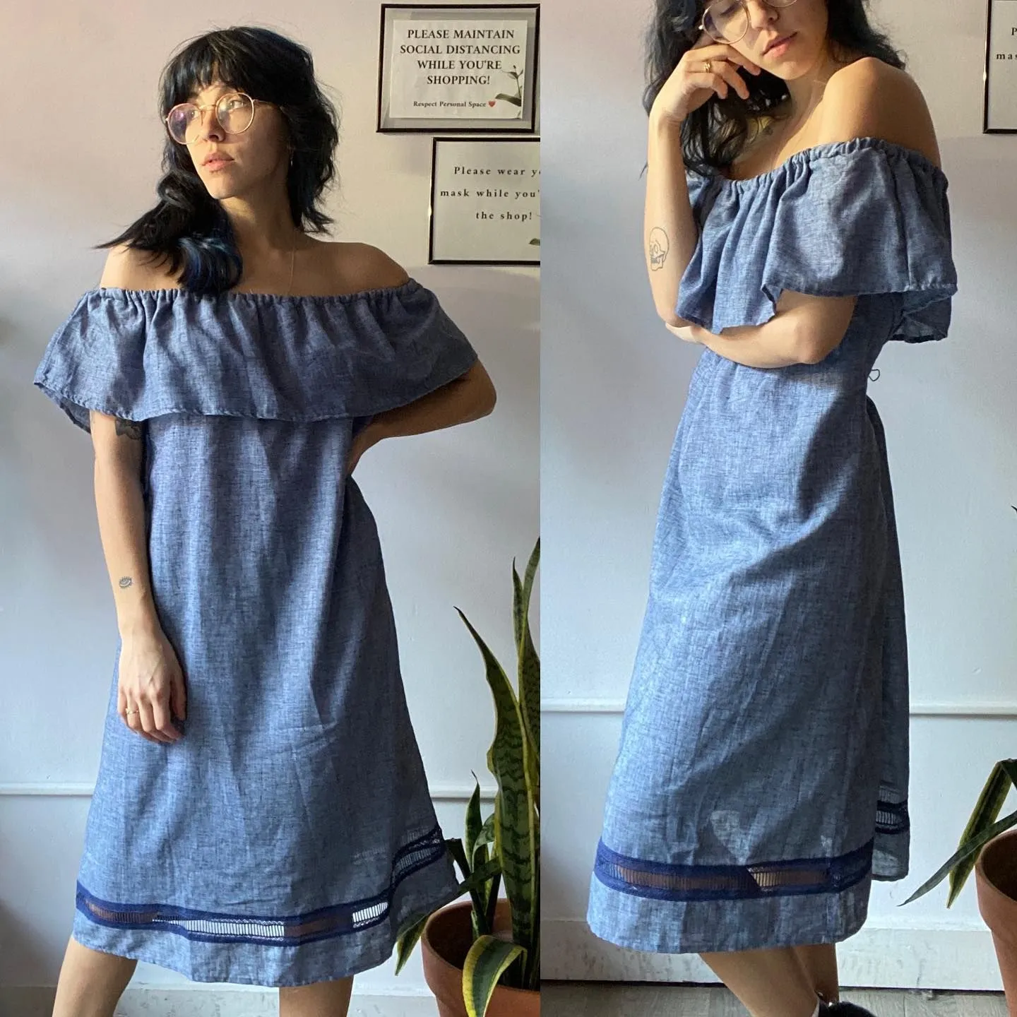 Model in a light blue chambray off-the-shoulder shift dress