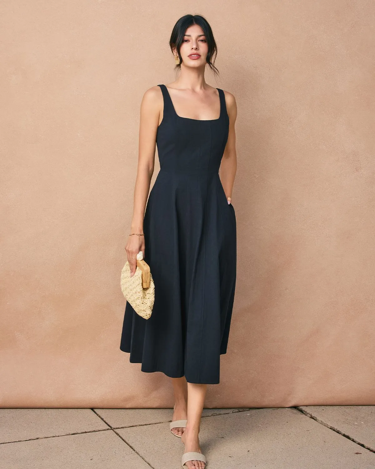 Navy square neck bridesmaid dress providing support for large busts