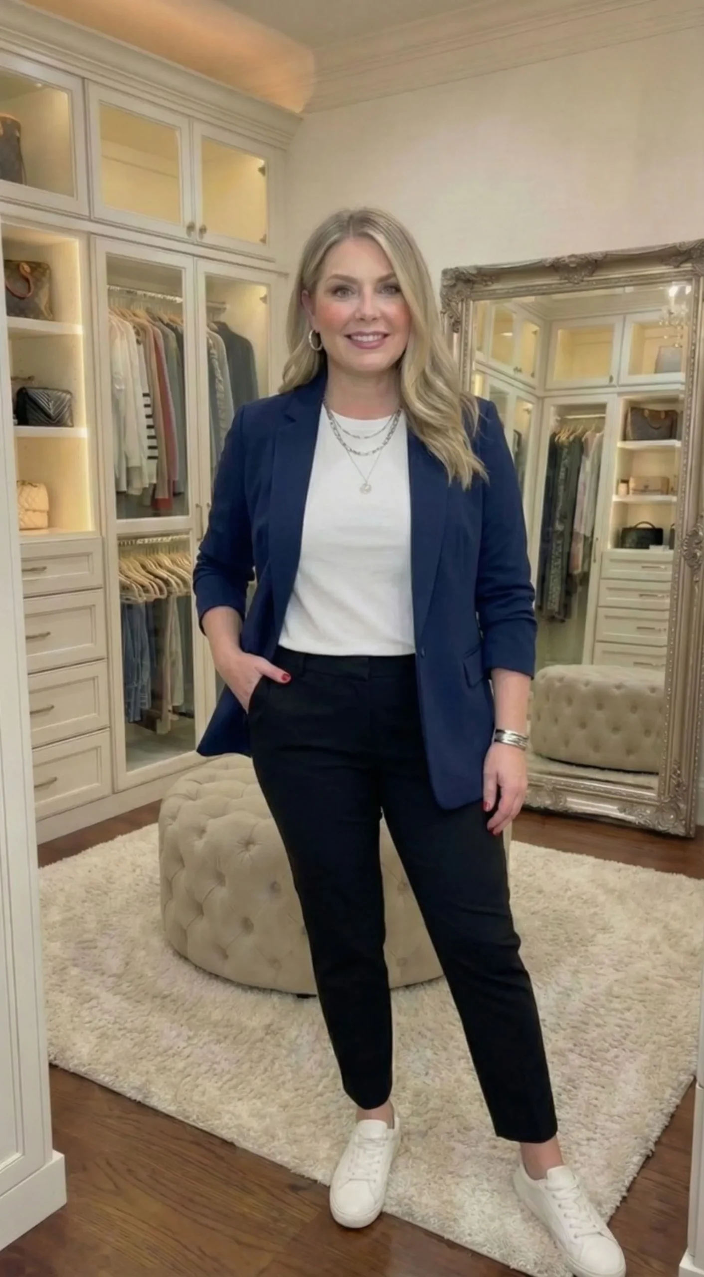 Plus size fashion model wearing structured open front navy blazer