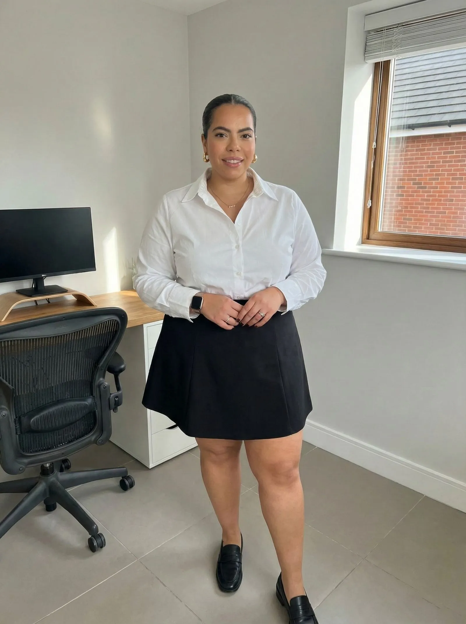 Plus size woman wearing a perfectly tailored white shirt