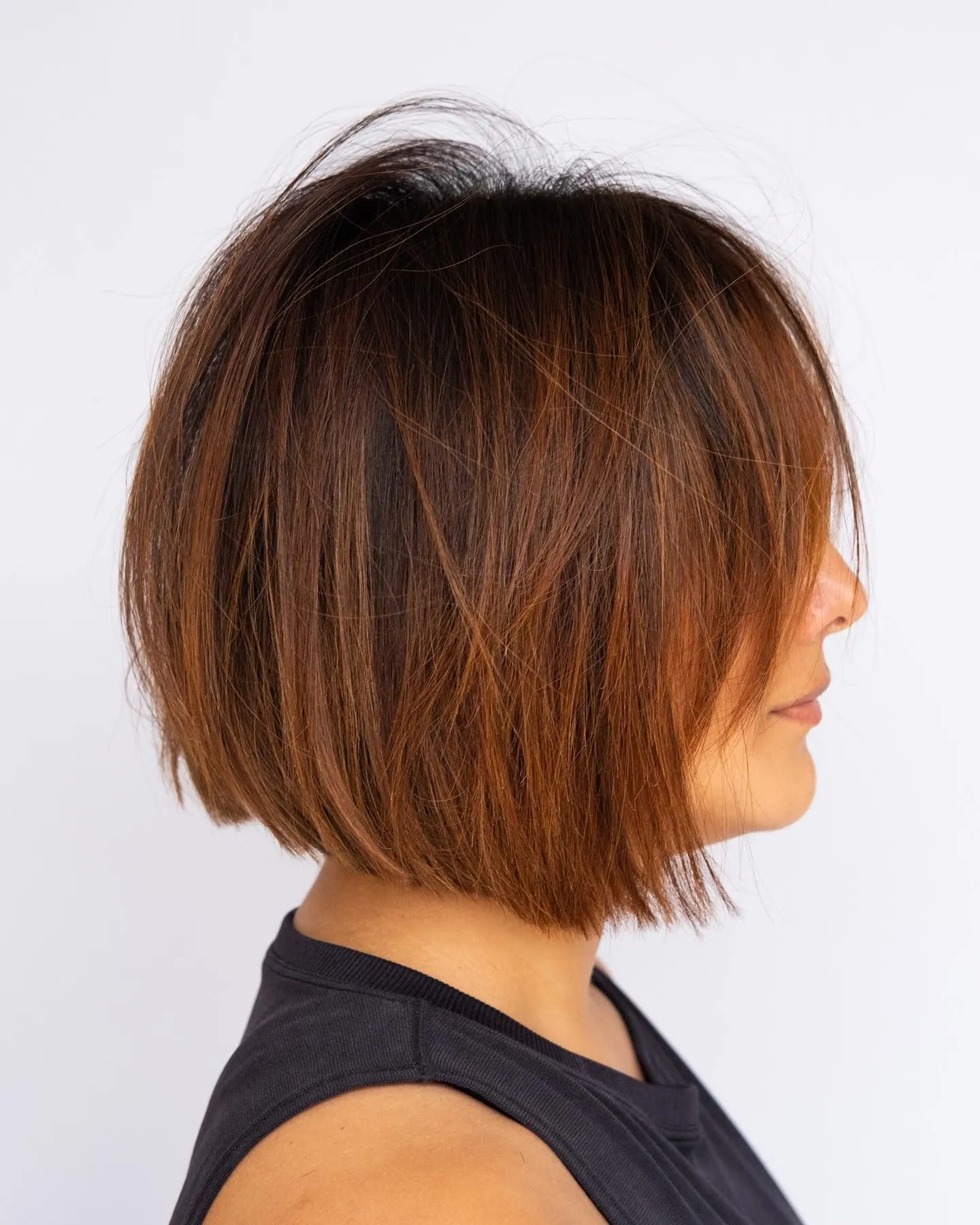 Close up of matte texture hair strands in a choppy bob style