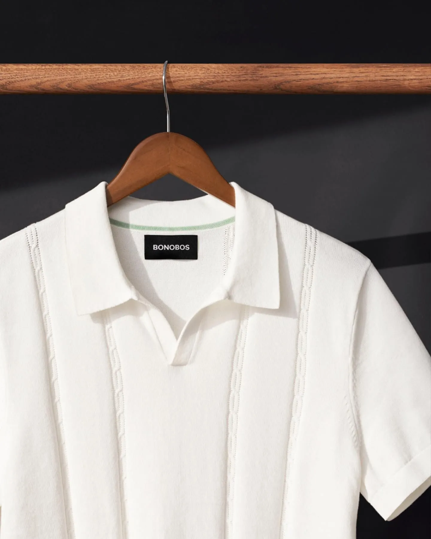 Cream colored vintage knitted polo shirt with ribbed texture