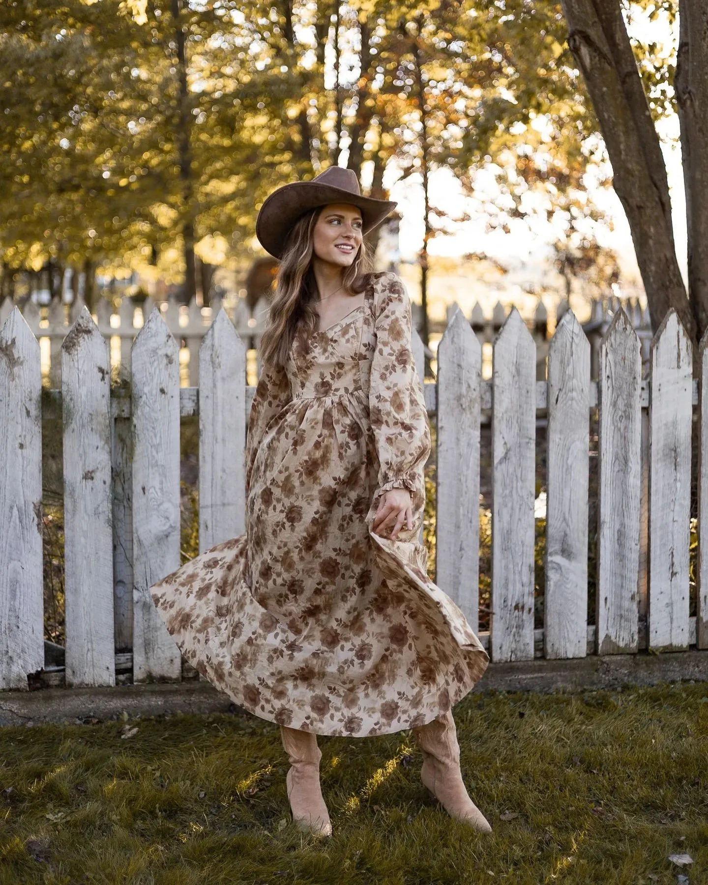 Assorted floral cotton fabrics with lace trims for prairie style dresses.