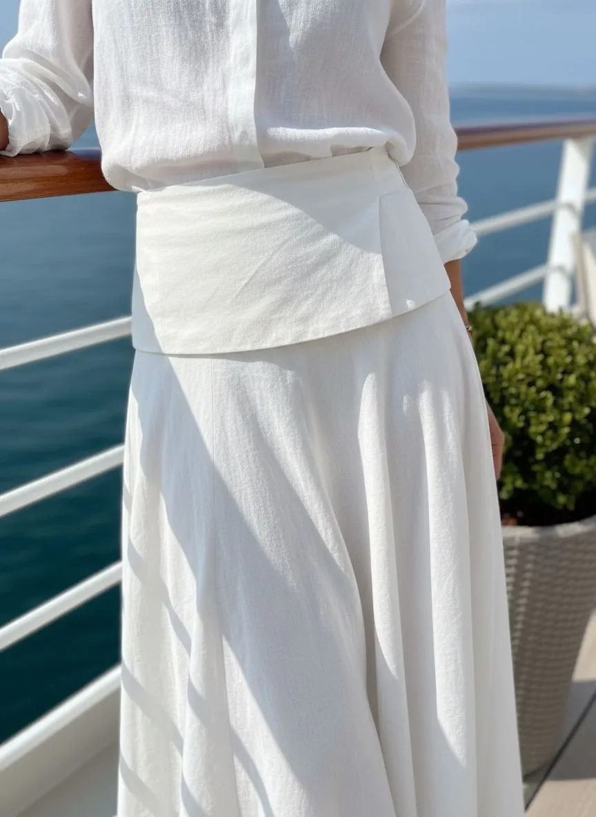 Close up of white linen skirt texture and A-line silhouette details