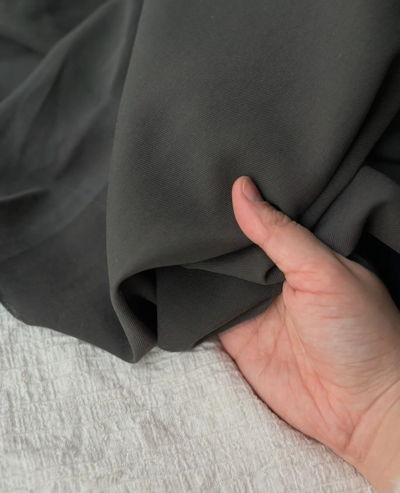 Close up of breathable matte technical crepe fabric suitable for office wear