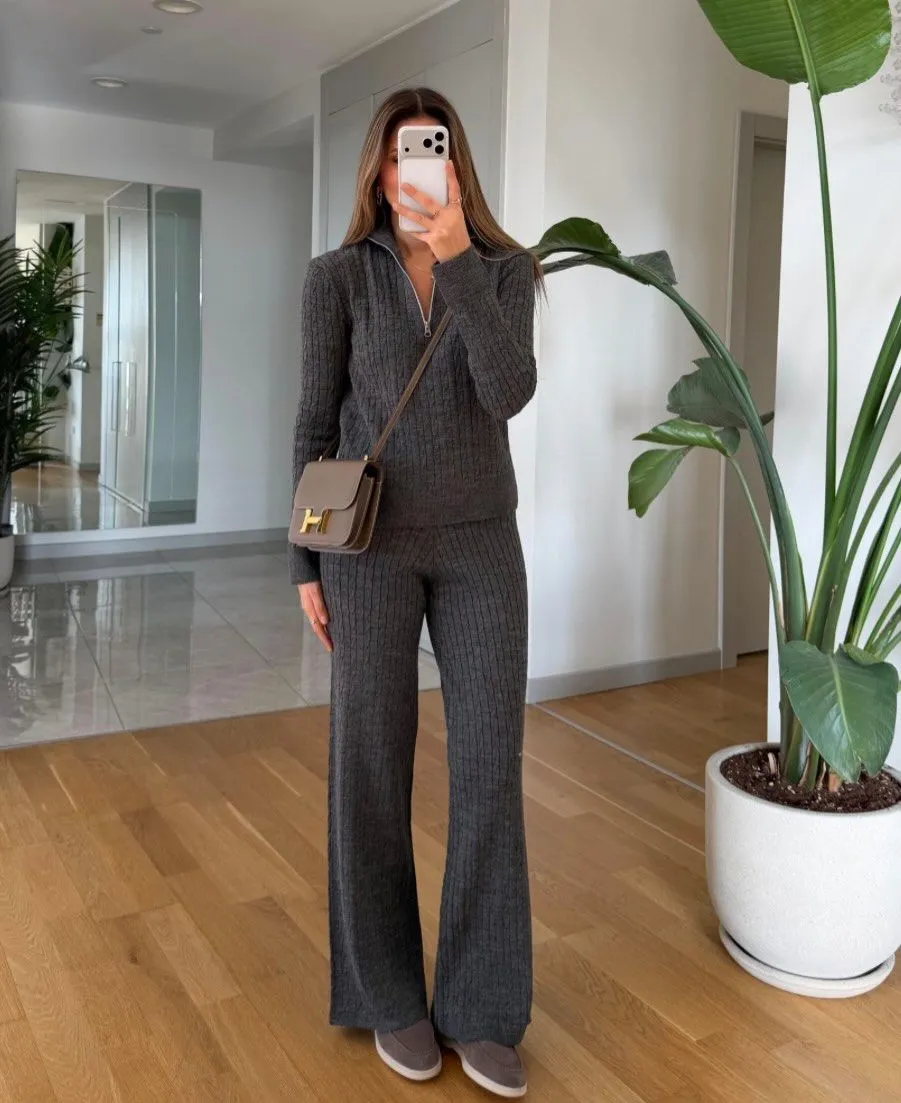 Slate gray knit midi skirt and cardigan styled with a belt