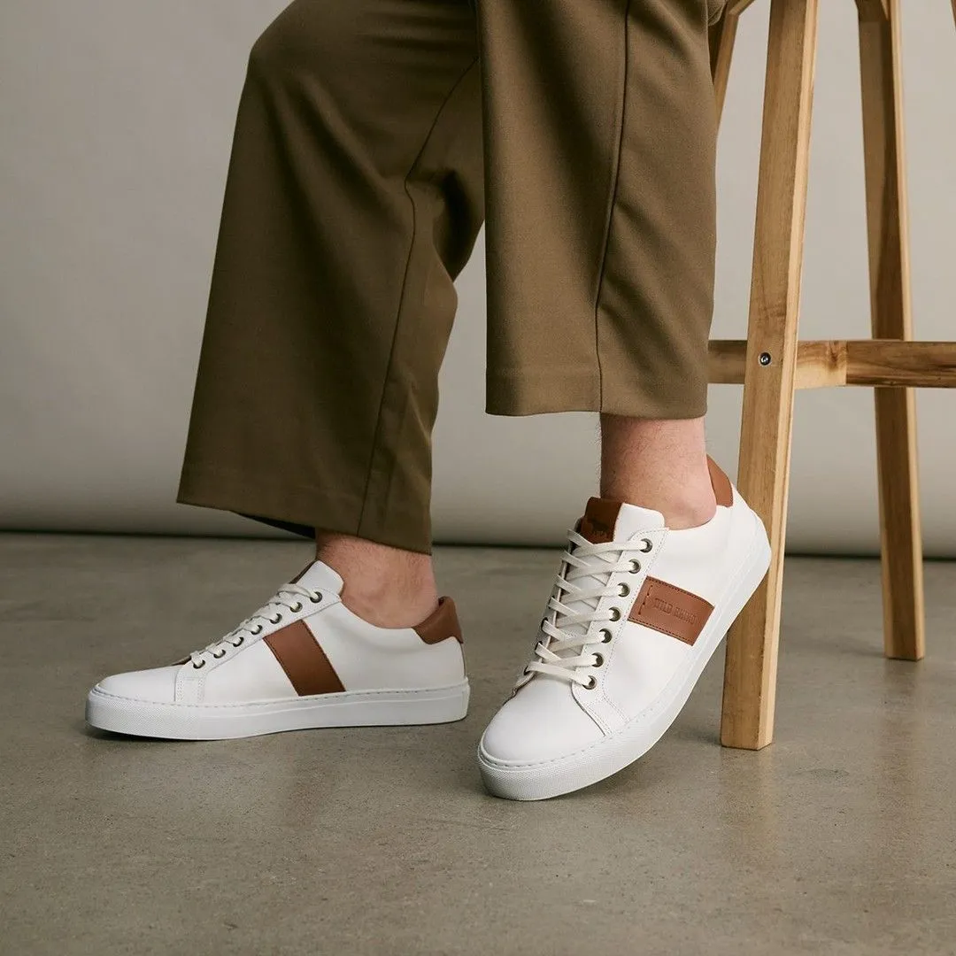 Close up of pristine white leather sneakers with soft suede accents