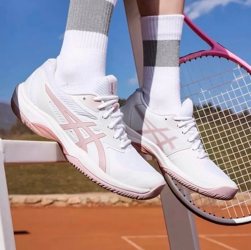 Crisp white leather retro sneakers perfect for a mansion walking tour