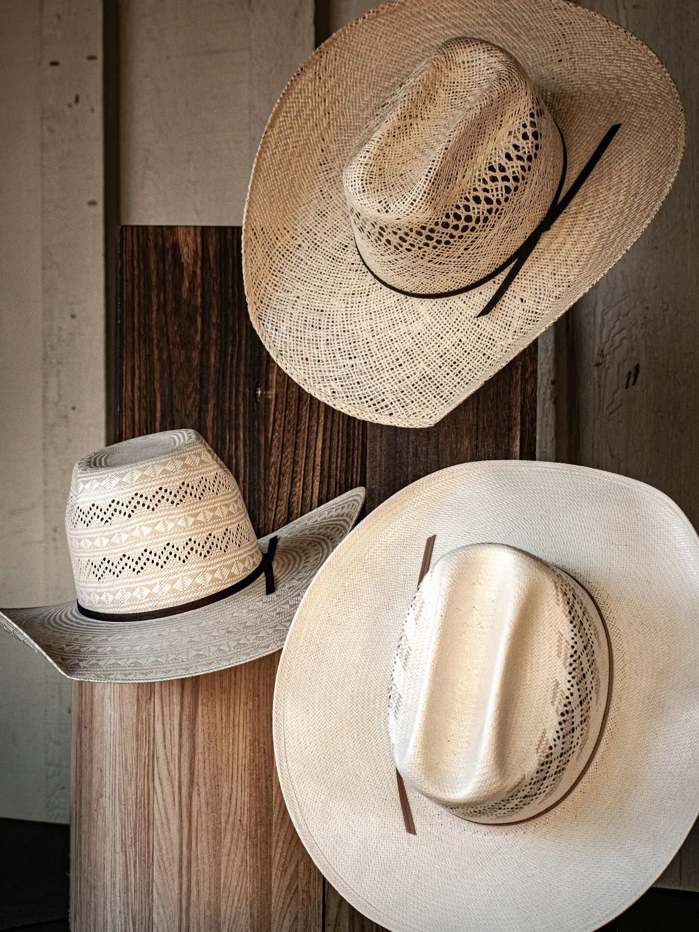 Straw hats in various shades of tan and cream for sun protection