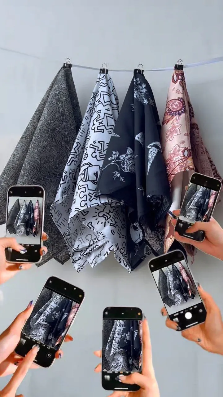 Flat lay of fall colored silk scarves