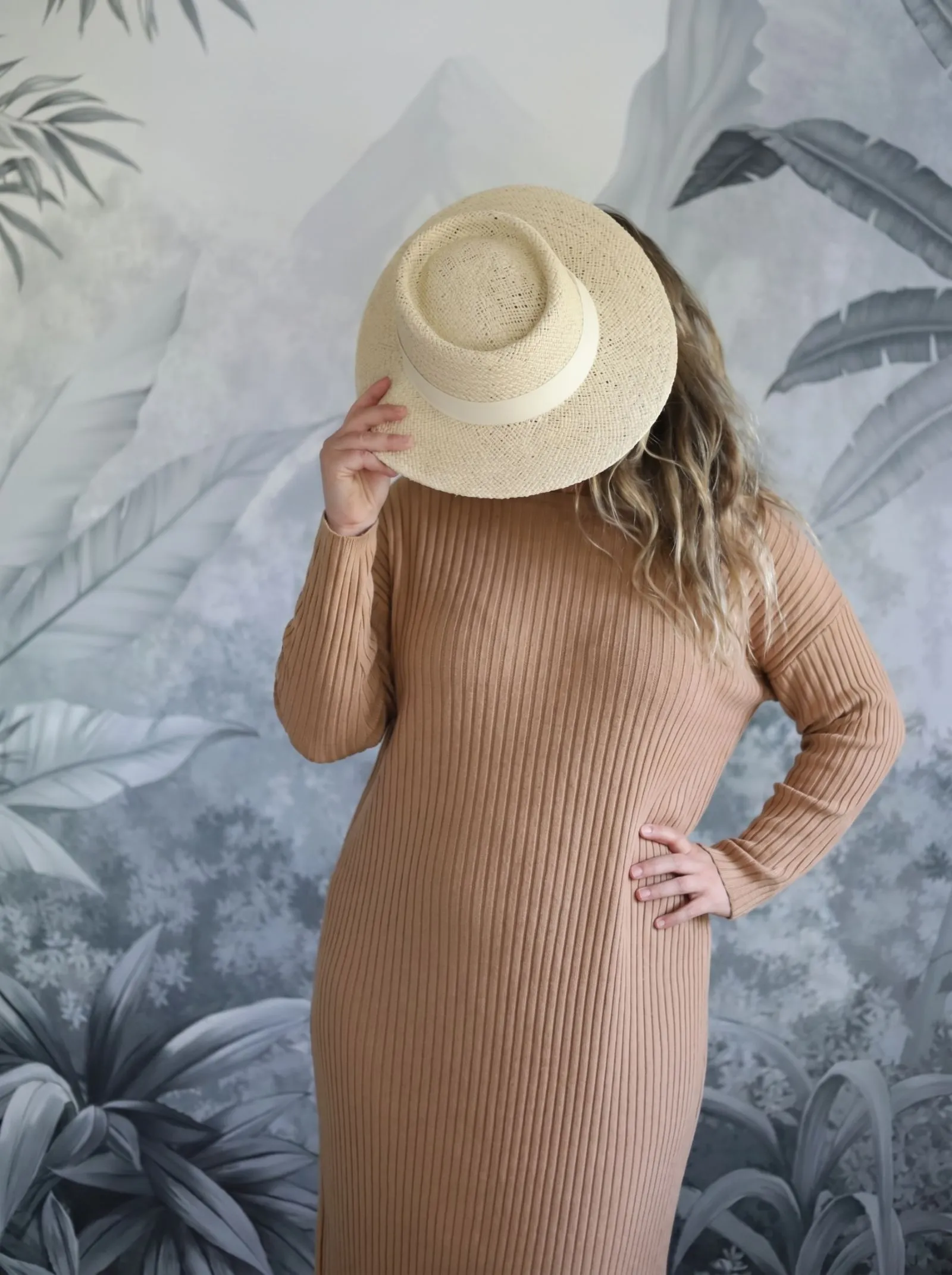 Detailed texture shot of soft camel ribbed knit fabric