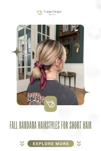 A stylish woman with a short bob hairstyle wearing a crimson silk bandana in an autumnal outdoor setting.