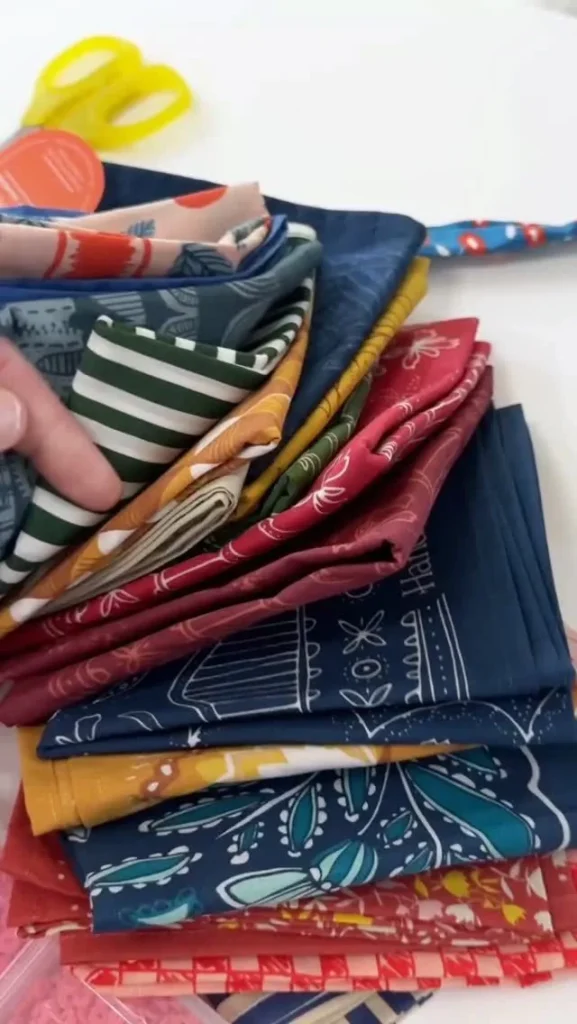 Selection of silk bandanas in autumn colors like olive and mustard