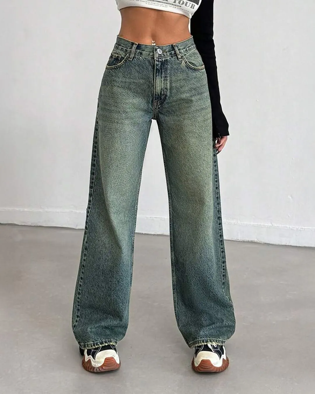 Detail of high waisted straight leg jeans